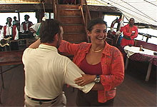 Guests dancing at the Tamarind Dhow Dinner Cruise